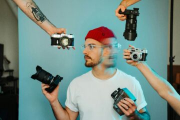 fotografo y varias cámaras